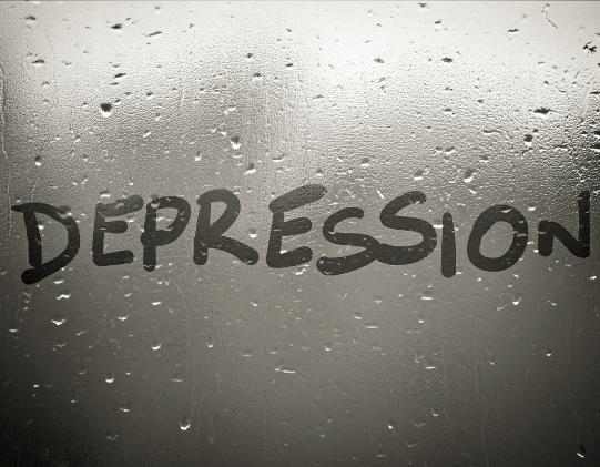 depression written on rainy window