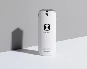 OneSkin OS-01 FACE topical peptide supplement in a white bottle featuring senescence peptide, niacinamide and multi-weight hyaluronic acid for skin firmness and radiance